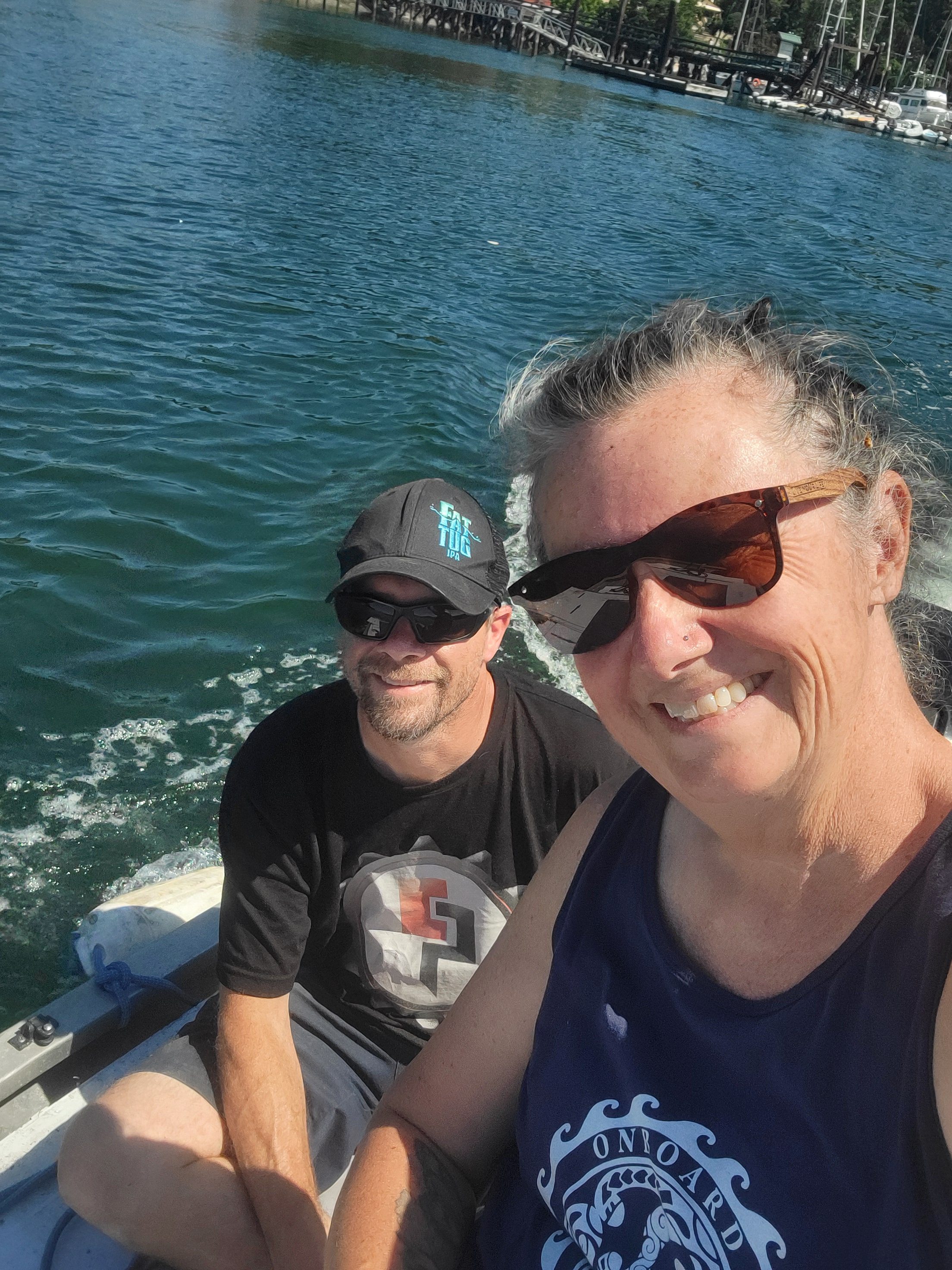 A photo of Blaine and Janis in their dinghy